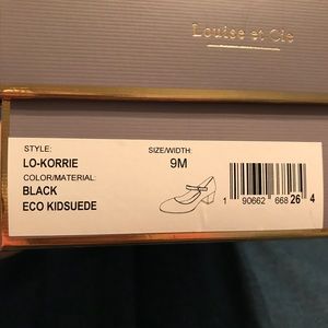 Black suede Mary Jane style pumps